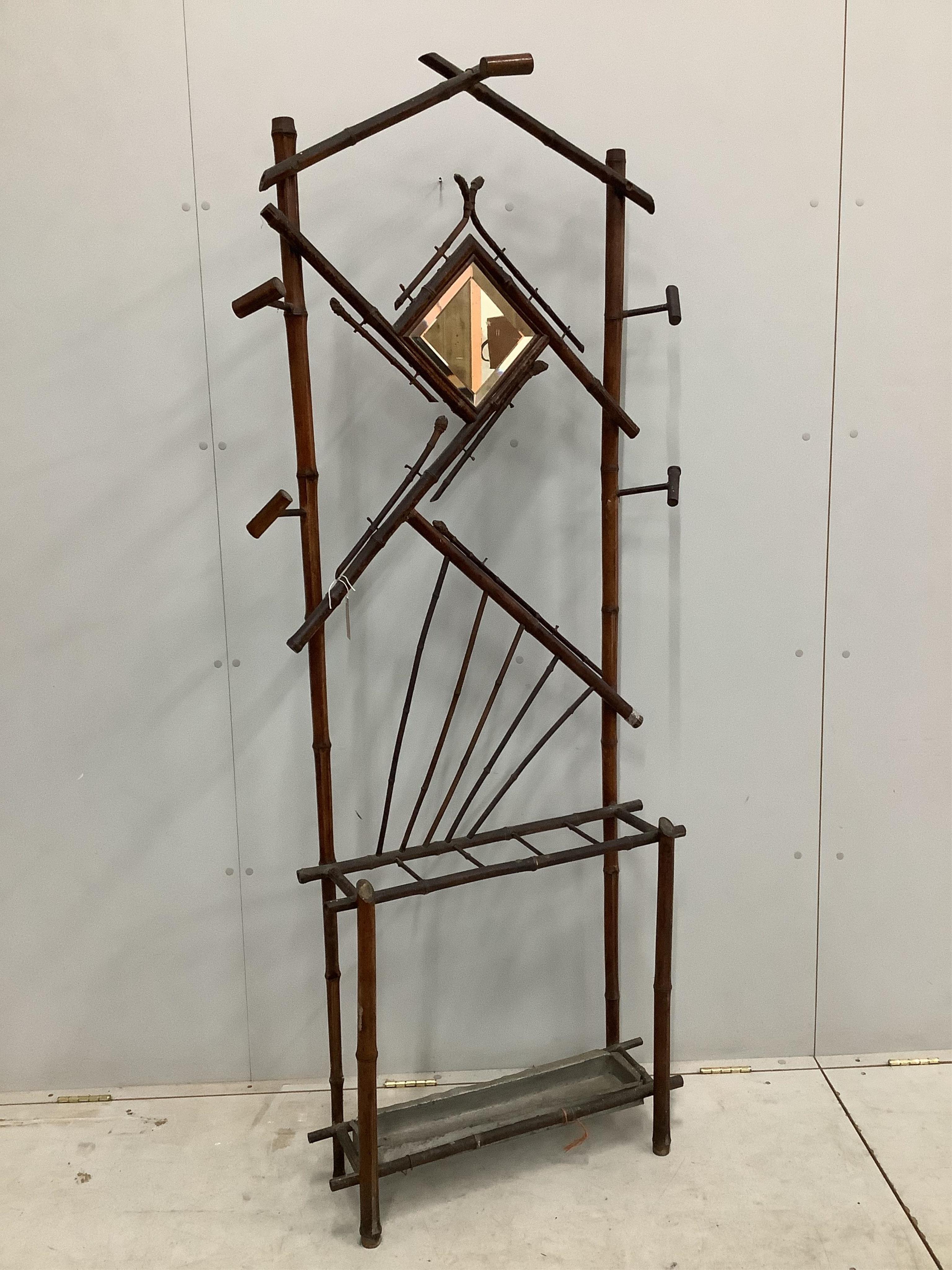 A Victorian bamboo hall stand, width 81cm, height 195cm. Condition - fair